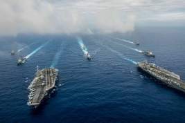 Американский адмирал призвал первыми перейти в наступление против России и Китая
