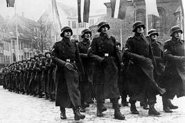 На марше памяти легионеров «Ваффен СС» в Риге задержали журналиста Грэма Филлипса