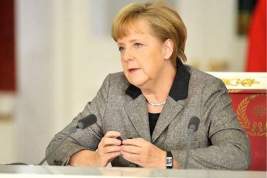 Нападение на Ангелу Меркель зафиксировано на камеру (видео)